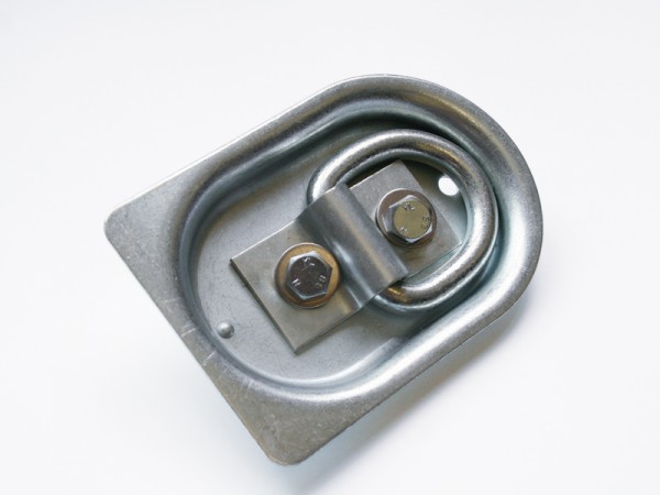 6 St. Anbinderinge versenkt in Holzboden, Zugkraft je 0,4 t. Die Ringe dürfen nur über den Querträgern montiert werden